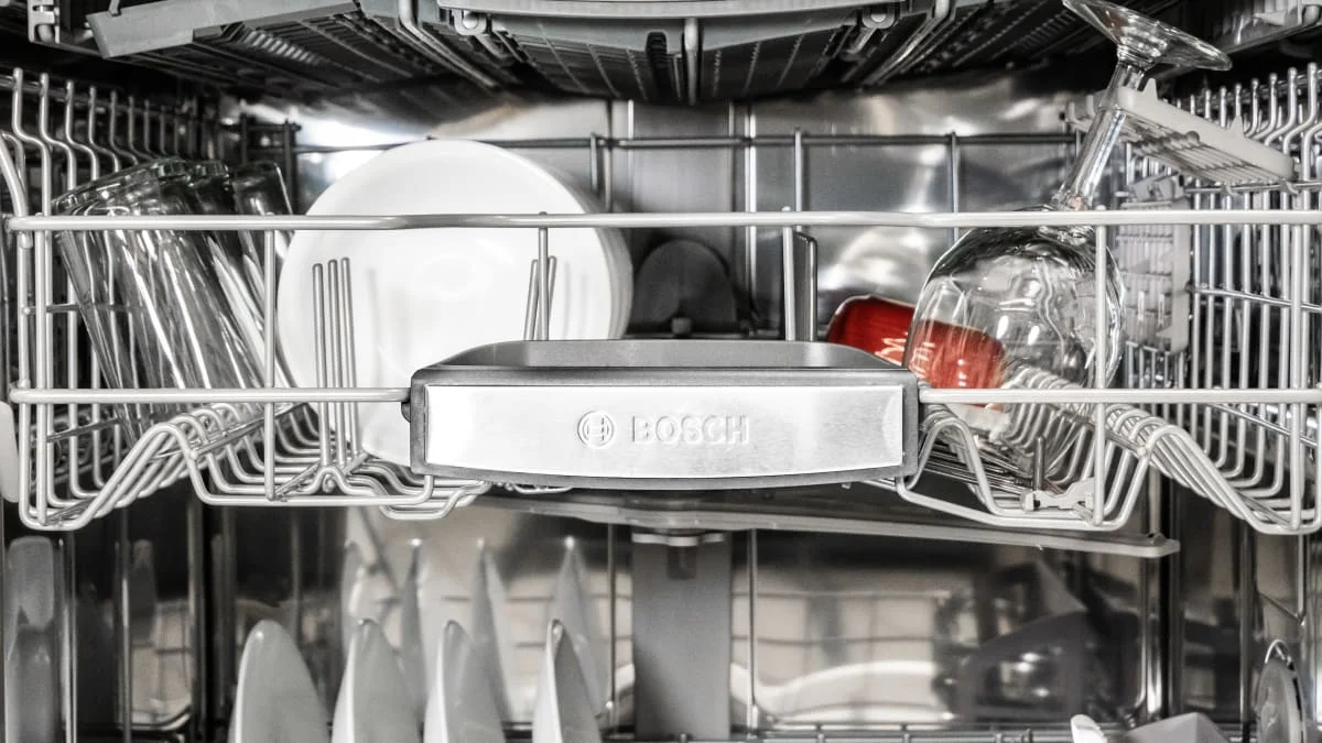 Interior view of a Bosch dishwasher with racks